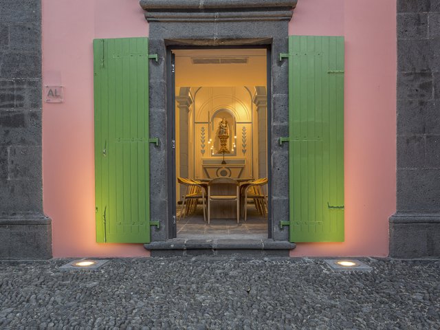 Renovated chapel at Quinta dos Peixes Falantes, São Miguel, Azores (Portugal): exterior double doors open to dining area